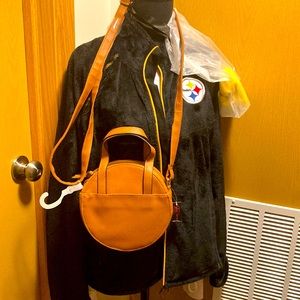 This is brand new with tag, caramel, not leather